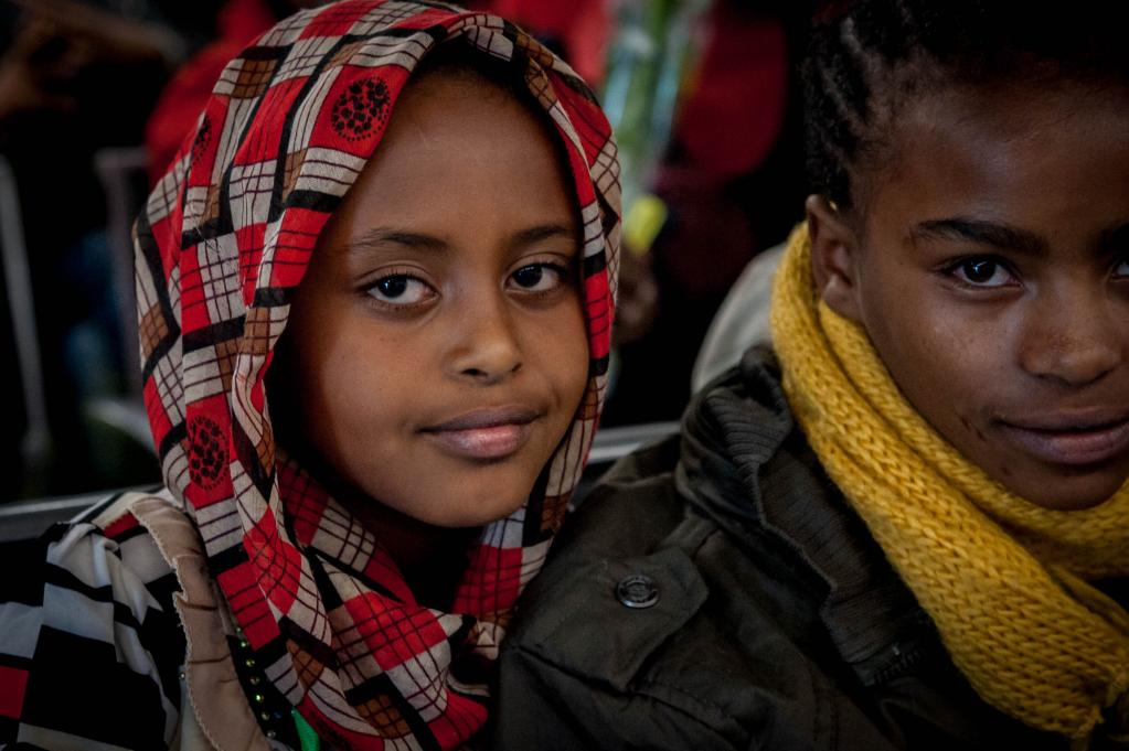 L'arrivo dei corridoi umanitari dall'Etiopia: 'Ci state aiutando a rendere l'Italia un paese migliore'.