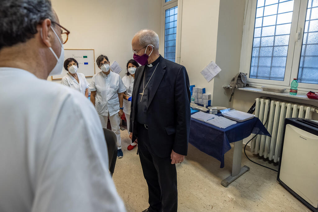 Justin Welby, Archbishop of Canterbury and Primate of the Church of England visits the Community and the vaccination Hub of Sant'Egidio on the eve of 