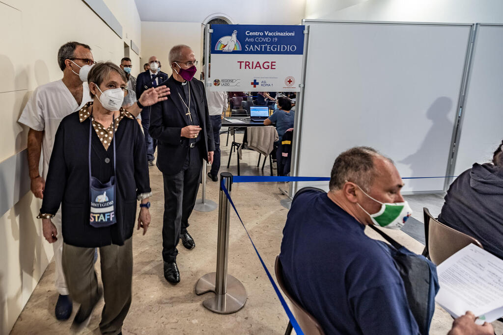 Justin Welby, Archbishop of Canterbury and Primate of the Church of England visits the Community and the vaccination Hub of Sant'Egidio on the eve of 